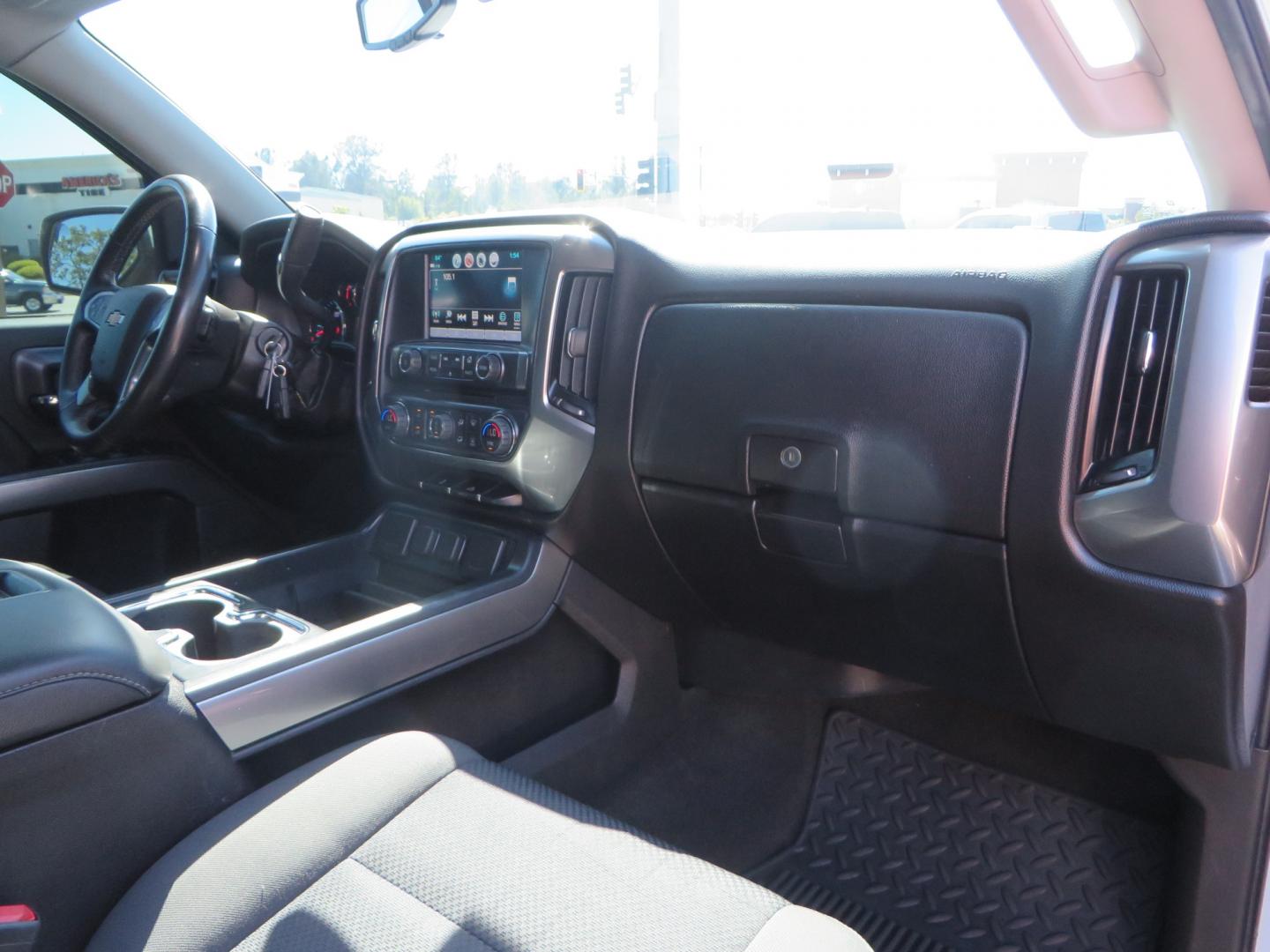 2018 White /BLACK Chevrolet Silverado 1500 LT (3GCPCREC7JG) with an 5.3L V8 OHV 16V engine, automatic transmission, located at 2630 Grass Valley Highway, Auburn, CA, 95603, (530) 508-5100, 38.937893, -121.095482 - Must see Pre Runner.... CST front lift spindals, Camburg UCA's, King Adjustable 2.5 Coil-overs, King 2.5 rear shocks, 35" Toyo RT Trail tires, 17" Method Race wheels, MZ front skid plate, G2 rear differntail cover, Full size bed mounted spare tire, Black Vinyl roof wrap, smoke tail lights and 3rd br - Photo#51